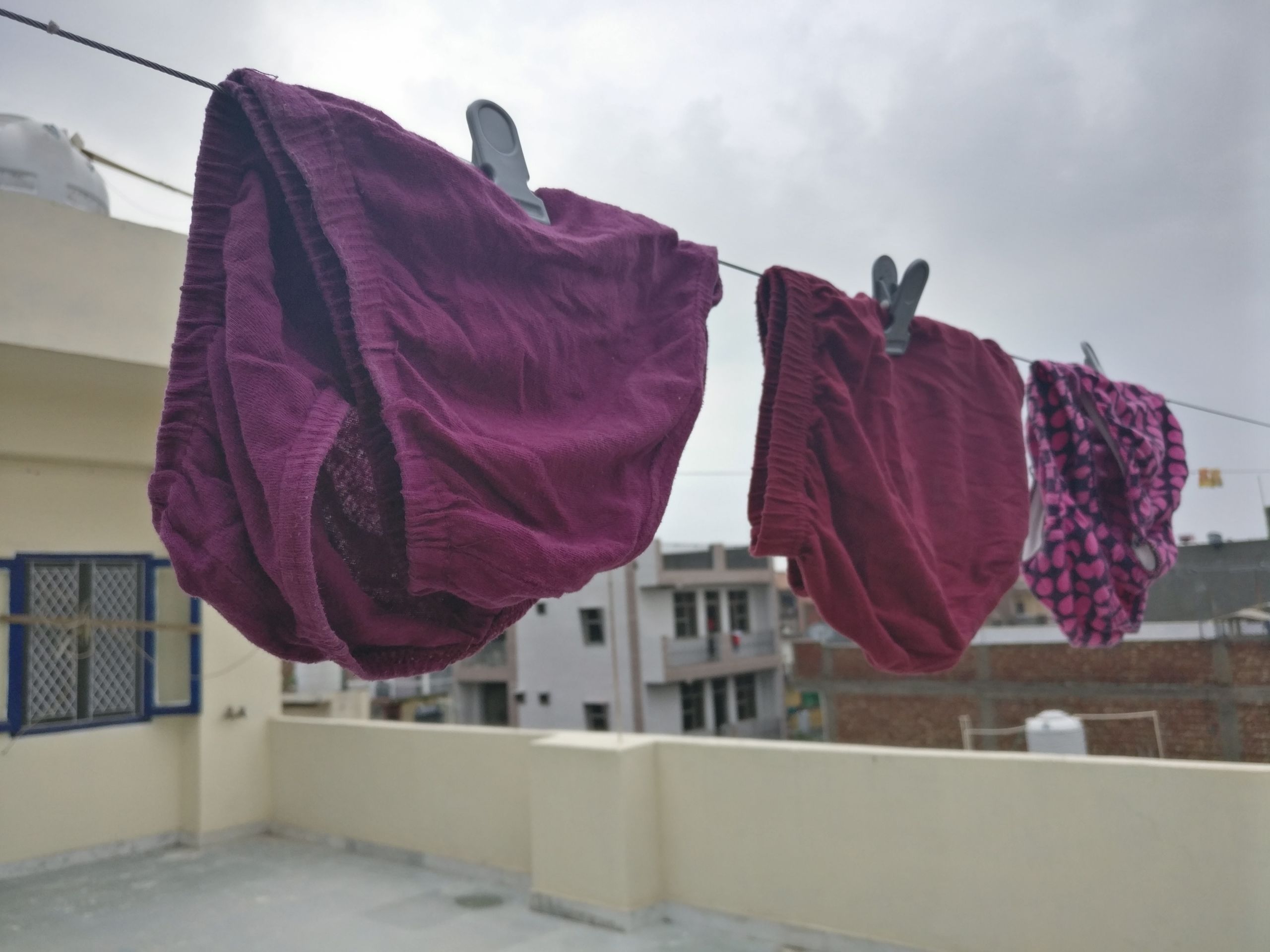 Panties hanging on a rope in Palam Village, India